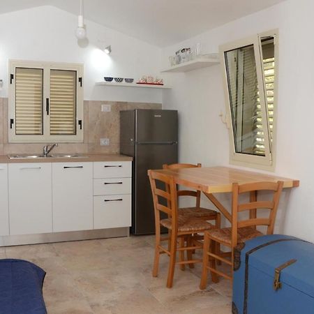 Apartments Villa Corrias Cala Liberotto Bagian luar foto