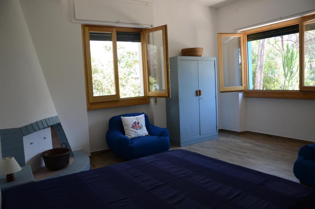Apartments Villa Corrias Cala Liberotto Bagian luar foto