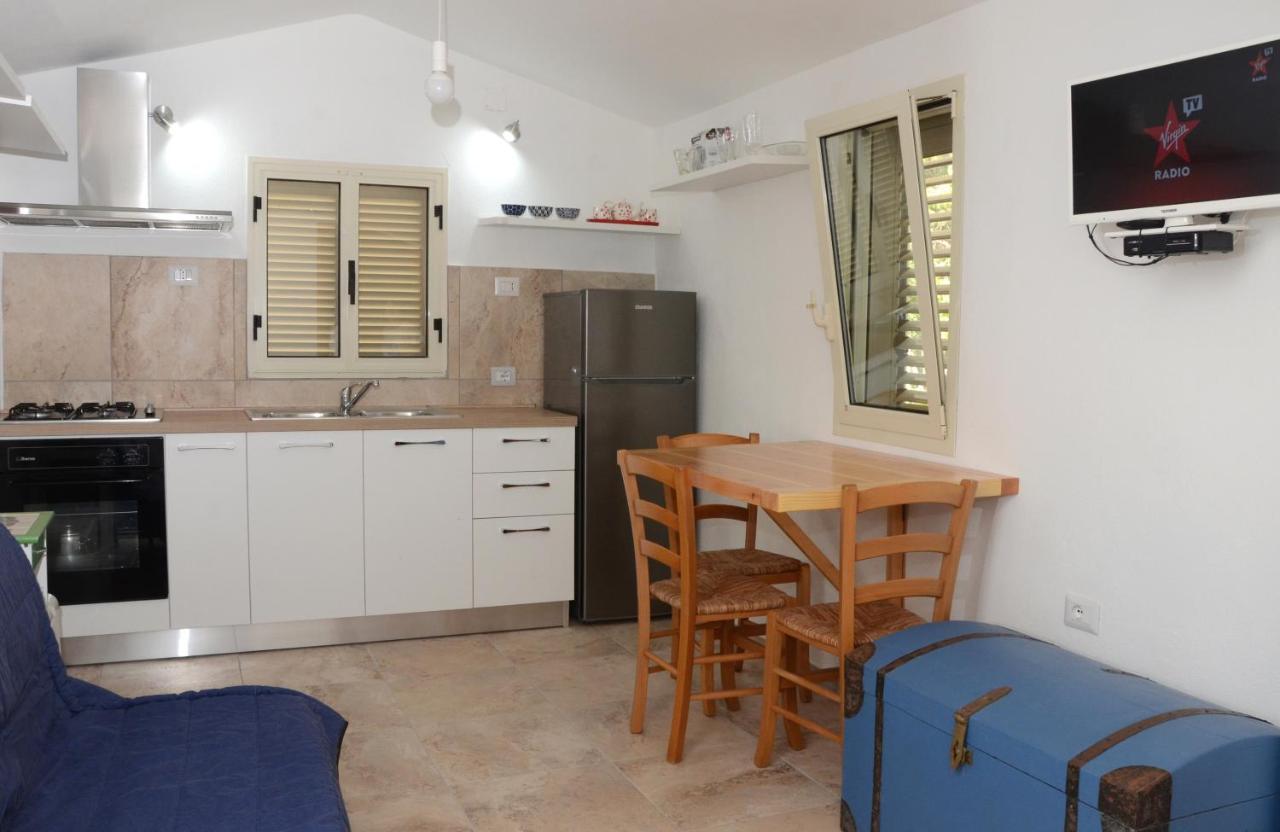 Apartments Villa Corrias Cala Liberotto Bagian luar foto