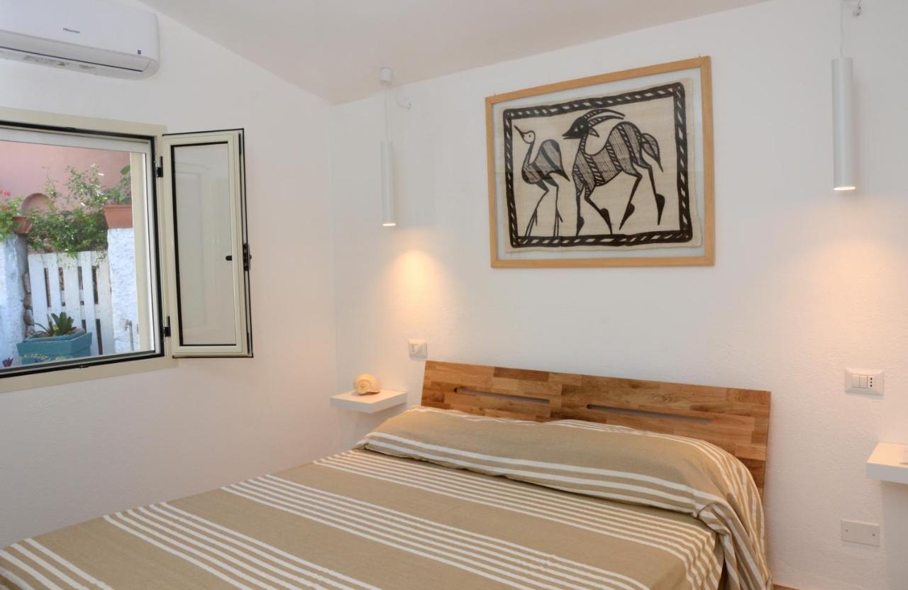 Apartments Villa Corrias Cala Liberotto Bagian luar foto